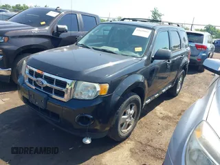 2011 Ford Escape XLT z VIN 1FMCU9DG6BKB21924, wystawiony jako IAAI lot #42645085 z przebiegiem 305 186 mil mil oraz . Historia ofert i sprzedaży dostępna na DreamBid. Obrazek 2.