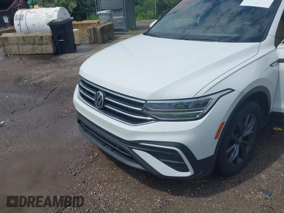 2022 Volkswagen Tiguan SE z VIN 3VV2B7AX0NM079702, wystawiony jako IAAI lot #42600950 z przebiegiem 91 826 mil mil oraz . Historia ofert i sprzedaży dostępna na DreamBid. Obrazek 6.