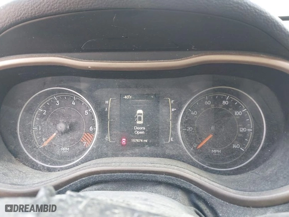 2015 Jeep Cherokee Sport with VIN 1C4PJLAB7FW732855, listed as a IAAI auction lot 41960540 with 157,674 mi miles. Bid and sale history available at carsss.com. Image 7.