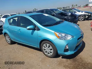 2014 Toyota Prius One z VIN JTDKDTB31E1066788, wystawiony jako IAAI lot #42515143 z przebiegiem 112 082 mil mil oraz . Historia ofert i sprzedaży dostępna na DreamBid. Obrazek 1.