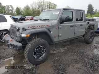 2020 Jeep Gladiator Mojave с VIN 1C6JJTEG9LL202452, выставлен на аукционе Copart как лот 56929215 с пробегом 64 680 миль миль и Списание • Salvage title. История ставок и продаж доступна на DreamBid. Изображение 1.