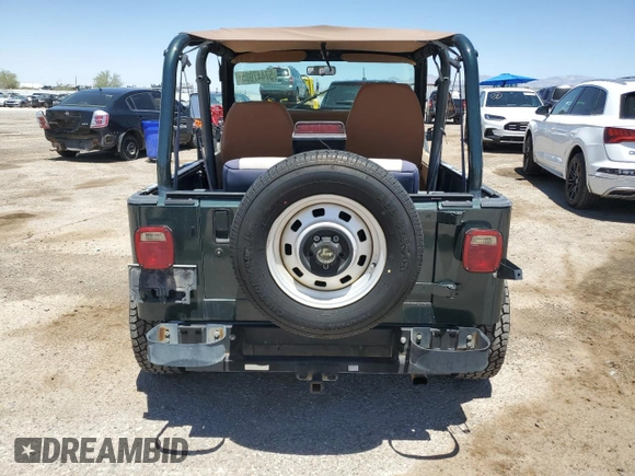 1994 Jeep Wrangler S with VIN 1J4FY19P7RP437520, listed as a Copart auction lot 57447085 with 124,023 mi miles and Salvage title. Bid and sale history available at DreamBid. Image 6.