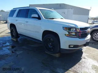 2019 Chevrolet Tahoe LT with VIN 1GNSKBKC7KR307869, listed as a IAAI auction lot 41833834 with 127,949 mi miles. Bid and sale history available at carsss.com. Image 1.