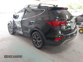 2018 Hyundai Santa Fe Ultimate z VIN 5NMZW4LA6JH054308, wystawiony jako IAAI lot #42385503 z przebiegiem 108 004 mil mil oraz . Historia ofert i sprzedaży dostępna na DreamBid. Obrazek 3.