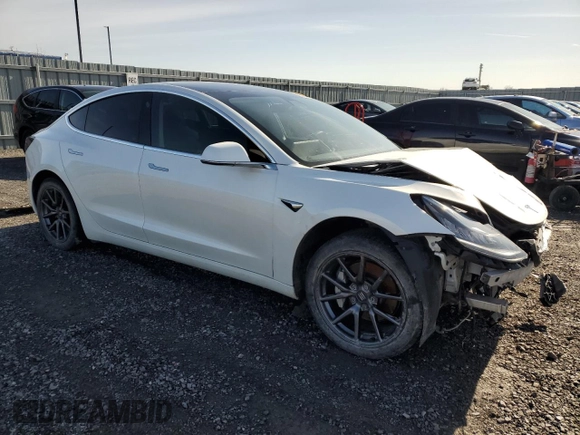 2020 Tesla Model 3 Standard Range Plus z VIN 5YJ3E1EA9LF718478, wystawiony jako Copart lot #52707145 z przebiegiem 111 068 mil mil oraz Szkoda całkowita • Salvage title. Historia ofert i sprzedaży dostępna na DreamBid. Obrazek 4.