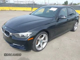 2012 BMW 3 Series 328i with VIN WBA3A5C56CF345904, listed as a IAAI auction lot 41992572 with 136,672 mi miles. Bid and sale history available at carsss.com. Image 2.