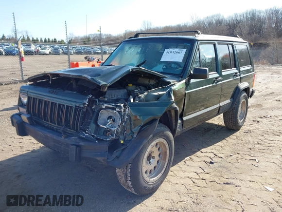 1996 Jeep Cherokee Sport with VIN 1J4FJ68S2TL299150, listed as a IAAI auction lot 41932867 with 142,761 mi miles. Bid and sale history available at carsss.com. Image 17.