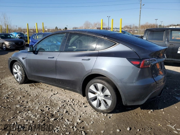 2023 Tesla Model Y Long Range z VIN 7SAYGDEE0PA206005, wystawiony jako Copart lot #50681145 z przebiegiem 31 989 mil mil oraz Szkoda całkowita • Salvage title. Historia ofert i sprzedaży dostępna na DreamBid. Obrazek 2.