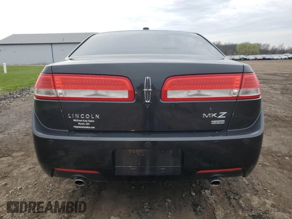 2012 Lincoln MKZ z VIN 3LNHL2JC3CR816733, wystawiony jako Copart lot #51353215 z przebiegiem 149 256 mil mil oraz Szkoda całkowita • Salvage title. Historia ofert i sprzedaży dostępna na DreamBid. Obrazek 6.