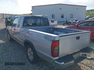 2000 Nissan Frontier XE with VIN 1N6DD26S5YC300697, listed as a IAAI auction lot 42031559 with 217,046 mi miles and . Bid and sale history available at DreamBid. Image 3.