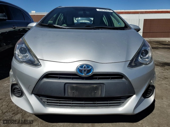 2015 Toyota Prius c One with VIN JTDKDTB30F1099699, listed as a Copart auction lot 49233655 with 106,041 mi miles and Salvage Title. Bid and sale history available at carsss.com. Image 5.