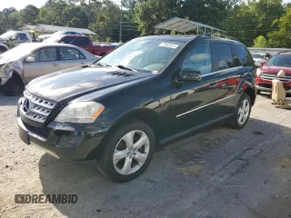 2011 Mercedes-Benz M 350 with VIN 4JGBB2FB5BA744077, listed as a Copart auction lot 61565615 with 125,813 mi miles and Salvage title. Bid and sale history available at DreamBid. Image 1.