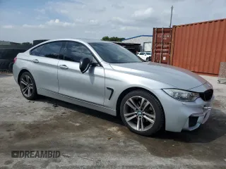 2015 BMW 4 Series 428i xDrive with VIN WBA4C9C55FD331210, listed as a Copart auction lot 54158235 with 88,372 mi miles and Salvage title. Bid and sale history available at DreamBid. Image 4.