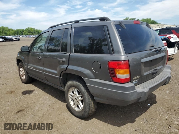 2004 Jeep Grand Cherokee Laredo with VIN 1J4GW48S64C291404, listed as a Copart auction lot 62835335 with 170,365 mi miles and Salvage title. Bid and sale history available at DreamBid. Image 2.