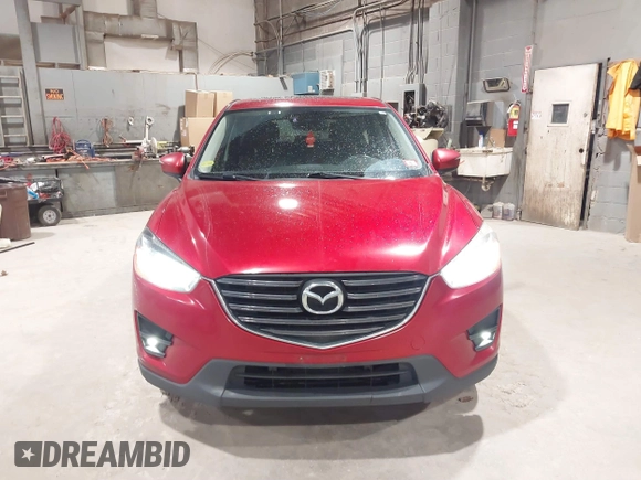 2016 Mazda CX-5 Grand Touring with VIN JM3KE4DY6G0690923, listed as a IAAI auction lot 41875553 with 179,489 mi miles. Bid and sale history available at carsss.com. Image 12.