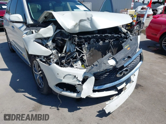 2016 Infiniti QX60 with VIN 5N1AL0MMXGC511972, listed as a IAAI auction lot 41979787 with 127,298 mi miles and . Bid and sale history available at DreamBid. Image 18.