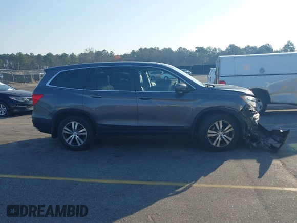 2017 Honda Pilot EX-L with VIN 5FNYF5H58HB011940, listed as a IAAI auction lot 41793151 with 118,088 mi miles. Bid and sale history available at carsss.com. Image 13.