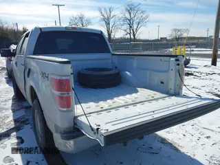 2014 Ford F-150 XL with VIN 1FTFW1EF5EFA45595, listed as a IAAI auction lot 41535410 with 124,208 mi miles. Bid and sale history available at carsss.com. Image 3.