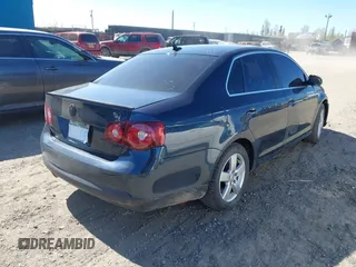 2009 Volkswagen Jetta SE with VIN 3VWRZ71K19M122492, listed as a IAAI auction lot 42270119 with 107,040 mi miles and . Bid and sale history available at DreamBid. Image 4.