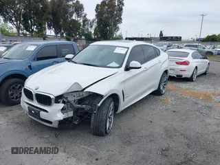 2018 BMW X6 xDrive35i with VIN 5UXKU2C5XJ0X50408, listed as a IAAI auction lot 41798784 with 69,134 mi miles. Bid and sale history available at carsss.com. Image 2.