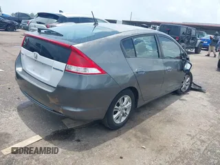 2010 Honda Insight EX z VIN JHMZE2H72AS023404, wystawiony jako IAAI lot #42505042 z przebiegiem Nie podano mil oraz . Historia ofert i sprzedaży dostępna na DreamBid. Obrazek 4.