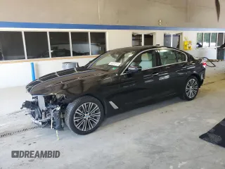 2018 BMW 5 Series 540i xDrive with VIN WBAJE7C56JWC57314, listed as a Copart auction lot 60610715 with 73,015 mi miles and Salvage title. Bid and sale history available at DreamBid. Image 1.