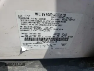 2018 Ford EcoSport Titanium z VIN MAJ6P1WL6JC171564, wystawiony jako Copart lot #57250695 z przebiegiem 63 805 mil mil oraz Szkoda całkowita • Salvage title. Historia ofert i sprzedaży dostępna na DreamBid. Obrazek 13.