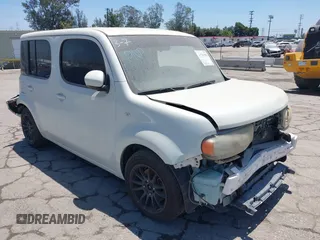 2011 Nissan Cube S z VIN JN8AZ2KR6BT205362, wystawiony jako IAAI lot #41741592 z przebiegiem 193 037 mil mil oraz . Historia ofert i sprzedaży dostępna na DreamBid. Obrazek 1.