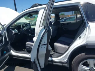 2019 Toyota RAV4 XLE with VIN JTMP1RFV8KD025971, listed as a IAAI auction lot 42673361 with 69,241 mi miles and . Bid and sale history available at DreamBid. Image 8.