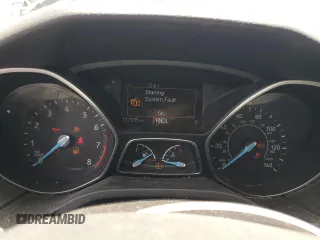 2016 Ford Focus SE z VIN 1FADP3F24GL309119, wystawiony jako Copart lot #62279095 z przebiegiem 117 535 mil mil oraz Szkoda całkowita • Salvage title. Historia ofert i sprzedaży dostępna na DreamBid. Obrazek 9.