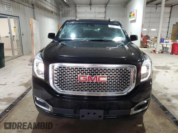 2015 GMC Yukon SLE with VIN 1GKS2AKC3FR664740, listed as a Copart auction lot 53824145 with 194,655 mi miles and Salvage Title. Bid and sale history available at carsss.com. Image 5.