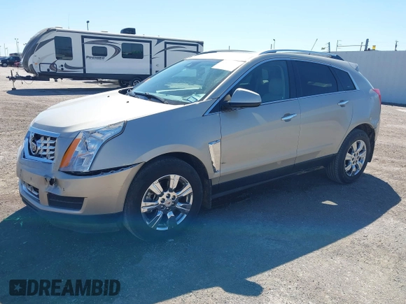 2015 Cadillac SRX Luxury Collection z VIN 3GYFNBE38FS641807, wystawiony jako IAAI lot #41669512 z przebiegiem 147 889 mil mil oraz . Historia ofert i sprzedaży dostępna na DreamBid. Obrazek 2.