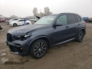 2021 BMW X5 sDrive40i with VIN 5UXCR4C01M9E98458, listed as a Copart auction lot 44289113 with 26,672 mi miles. Bid and sale history available at carsss.com. Image 1.