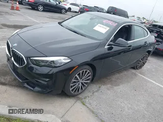 2021 BMW 2 Series 228i with VIN WBA53AK04M7H59327, listed as a IAAI auction lot 41879591 with 13,855 mi miles. Bid and sale history available at carsss.com. Image 17.