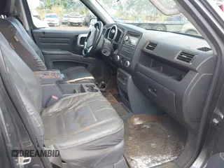 2008 Honda Ridgeline RTL z VIN 2HJYK16548H517715, wystawiony jako IAAI lot #41818060 z przebiegiem 239 399 mil mil oraz . Historia ofert i sprzedaży dostępna na DreamBid. Obrazek 5.