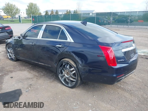 2015 Cadillac CTS Luxury AWD with VIN 1G6AX5SX5F0119102, listed as a IAAI auction lot 42231015 with 106,643 mi miles and . Bid and sale history available at DreamBid. Image 3.