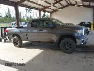 2012 Toyota Tundra with VIN 5TFUY5F13CX259312, listed as a IAAI auction lot 42547918 with 182,190 mi miles and . Bid and sale history available at DreamBid. Image 14.
