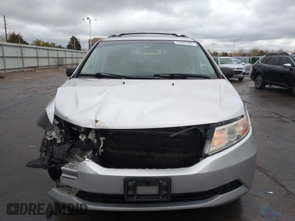 2012 Honda Odyssey EX-L with VIN 5FNRL5H68CB141022, listed as a Copart auction lot 54605485 with 185,388 mi miles and Salvage Title. Bid and sale history available at carsss.com. Image 5.