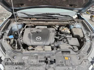 2015 Mazda CX-5 Sport with VIN JM3KE2BE3F0488309, listed as a Copart auction lot 63688835 with 121,775 mi miles and Clean title. Bid and sale history available at DreamBid. Image 12.