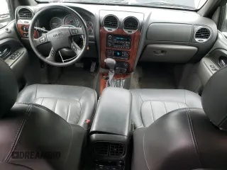 2004 GMC Envoy SLT with VIN 1GKDT13S942279670, listed as a Copart auction lot 73527974 with 120,425 mi miles and Salvage Title. Bid and sale history available at DreamBid. Image 8.