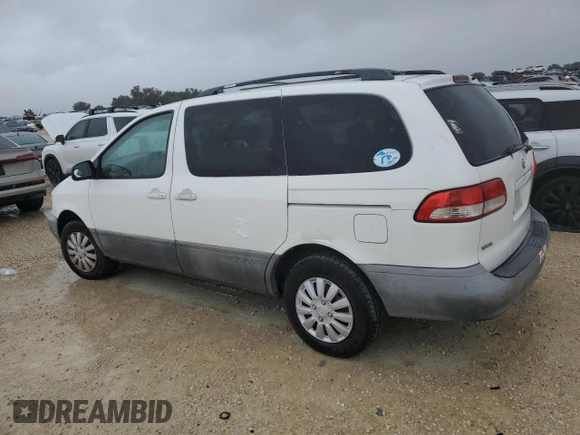 2001 Toyota Sienna LE with VIN 4T3ZF13C21U369506, listed as a Copart auction lot 74561634 with 0 mi miles and Salvage Title. Bid and sale history available at carsss.com. Image 2.