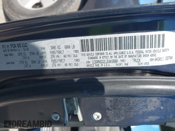 2018 Ram 1500 SLT z VIN 1C6RR6GG2JS303880, wystawiony jako IAAI lot #42138224 z przebiegiem 120 533 mil mil oraz . Historia ofert i sprzedaży dostępna na DreamBid. Obrazek 9.