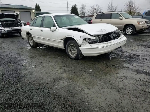 1995 Ford Crown Victoria LX с VIN 2FALP74W1SX200511, выставлен на аукционе Copart как лот 48807055 с пробегом 62 133 миль миль и Списание • Salvage title. История ставок и продаж доступна на DreamBid. Изображение 11.