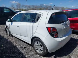 2016 Chevrolet Sonic LT with VIN 1G1JC6SH2G4134831, listed as a IAAI auction lot 41983302 with 85,828 mi miles. Bid and sale history available at carsss.com. Image 3.