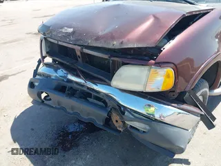 2000 Ford F-150 XL with VIN 1FTRX18L5YNA99713, listed as a IAAI auction lot 42194838 with Not provided miles and . Bid and sale history available at DreamBid. Image 12.