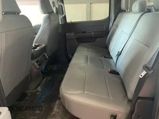 2022 Ford F-150 Lightning Pro with VIN 1FTVW1EL5NWG11725, listed as a IAAI auction lot 42832825 with 5,044 mi miles and . Bid and sale history available at DreamBid. Image 21.