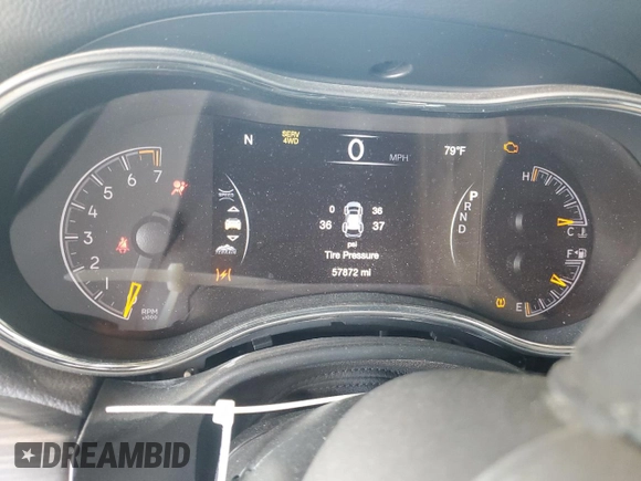2021 Jeep Grand Cherokee 80th Anniversary with VIN 1C4RJFBG3MC631086, listed as a Copart auction lot 57304375 with 57,872 mi miles and Salvage title. Bid and sale history available at DreamBid. Image 9.