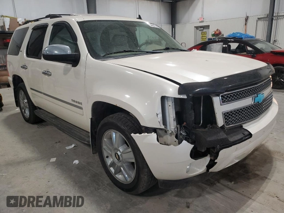 2010 Chevrolet Tahoe LTZ with VIN 1GNUKCE02AR274147, listed as a Copart auction lot 54667545 with 210,207 mi miles and Salvage title. Bid and sale history available at DreamBid. Image 4.