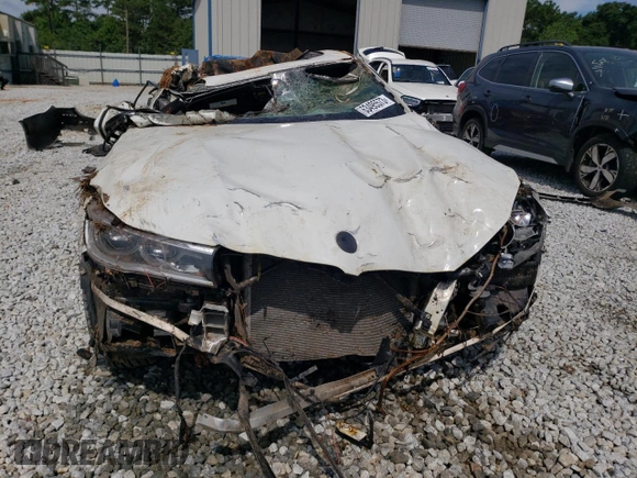 2018 BMW 7 Series 750i with VIN WBA7F0C55JGM23022, listed as a Copart auction lot 63495573 with 0 mi miles and Salvage Title. Bid and sale history available at carsss.com. Image 5.