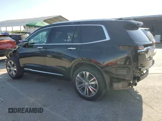2021 Cadillac XT6 Premium Luxury with VIN 1GYKPDRS4MZ175962, listed as a Copart auction lot 59993565 with 97,157 mi miles and Salvage title. Bid and sale history available at DreamBid. Image 2.